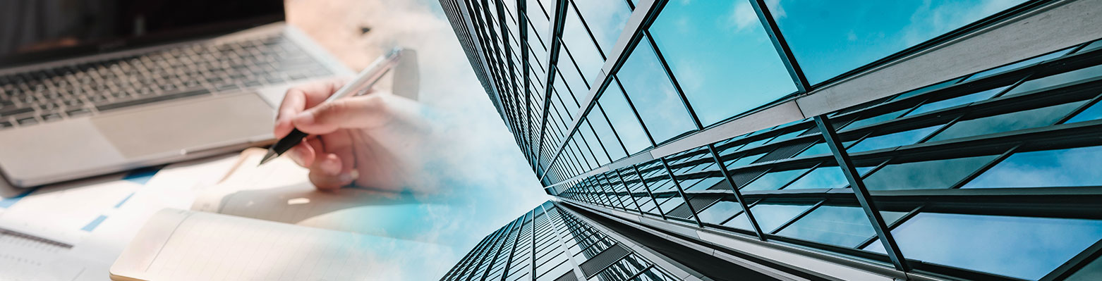 A view of the sky from below looking up at a building.